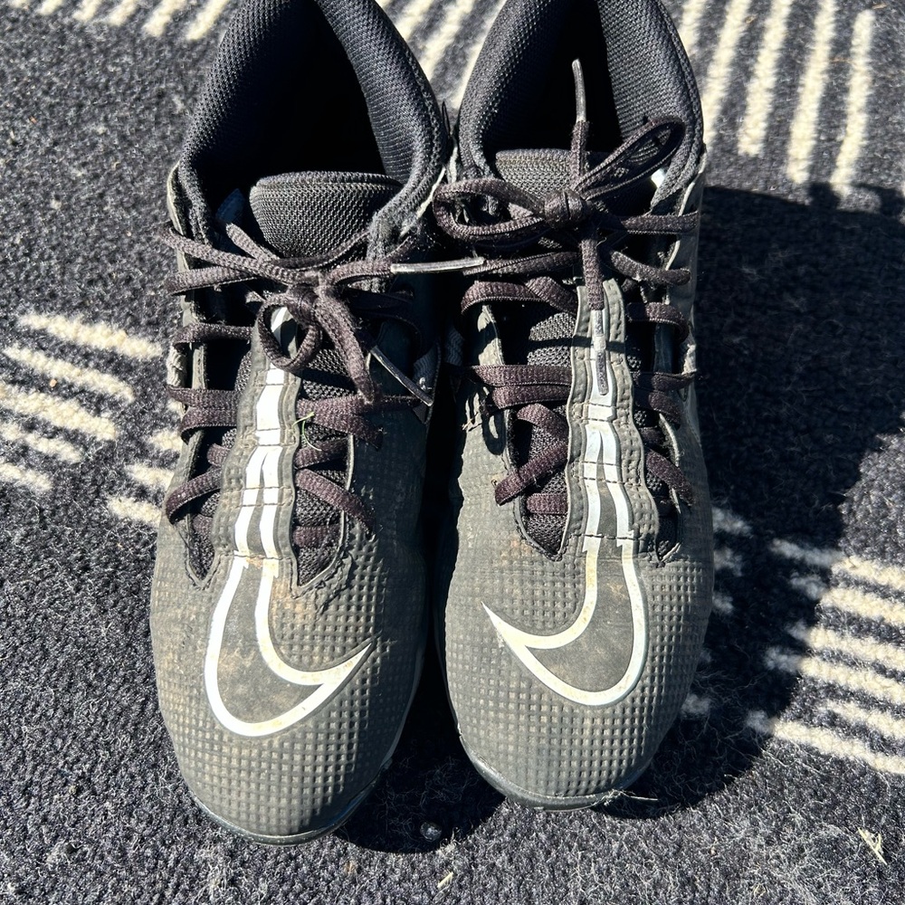 Nike Black Cleats with Silver Swoosh Accent